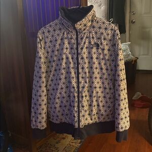 The North Face Blue and White Patterned Jacket